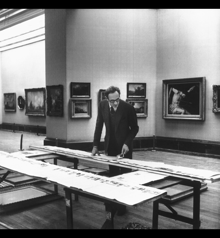 Sir Philip Hendy rehanging paintings in Duveen room, 1956.