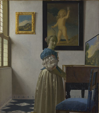 Johannes Vermeer: 'A Young Woman standing at a Virginal'