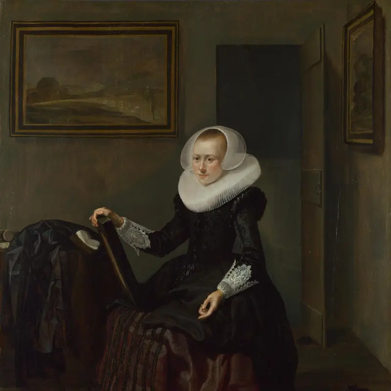 A Woman holding a Mirror