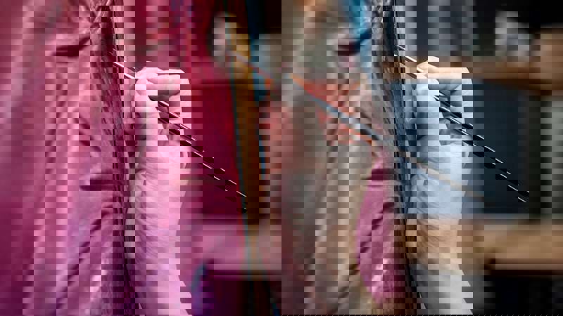 close up of hand oil painting