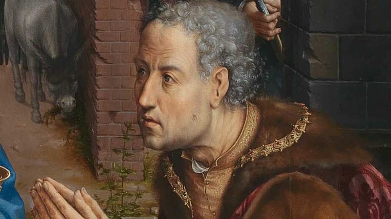 Detail of Jan Gossaert (Jean Gossart), 'The Adoration of the Kings', 1510–15. A man on his knees in front of a baby.