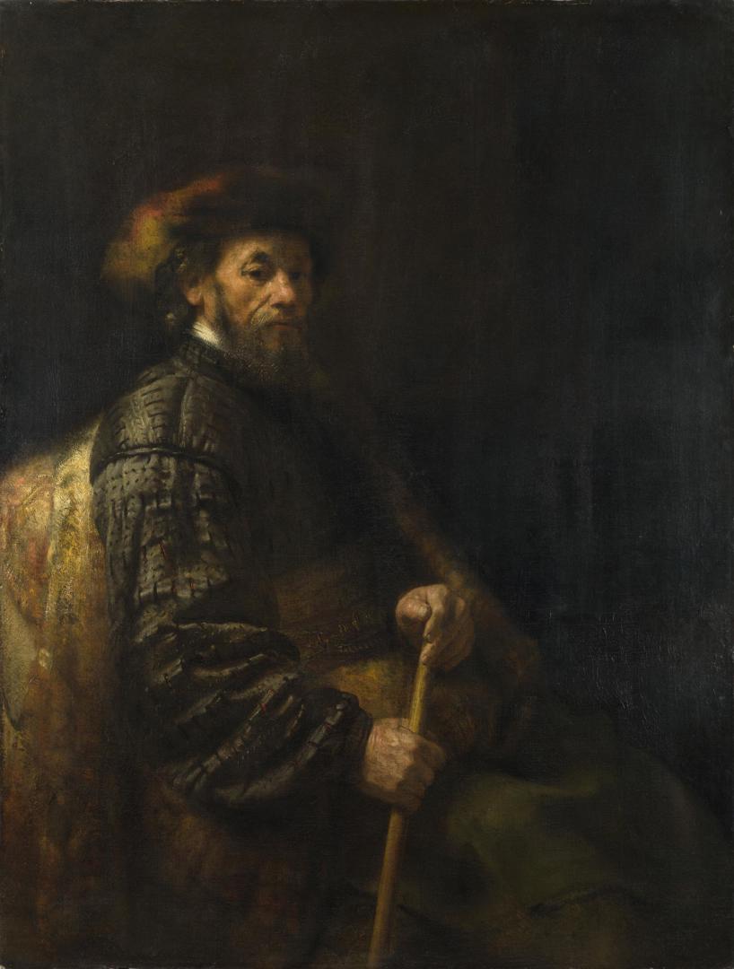 A Seated Man with a Stick by Follower of Rembrandt
