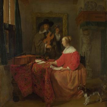A Woman seated at a Table and a Man tuning a Violin
