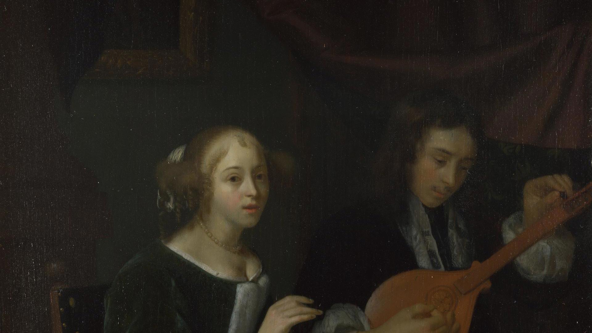A Woman singing and a Man with a Cittern by Godfried Schalcken