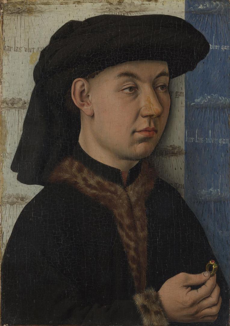 A Young Man holding a Ring by Follower of Jan van Eyck