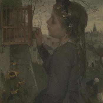 A Girl feeding a Bird in a Cage