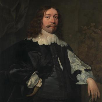 Portrait of a Man in Black holding a Glove