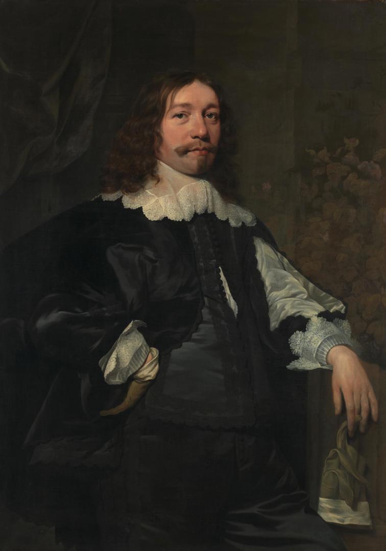 Portrait of a Man in Black holding a Glove by Bartholomeus van der Helst