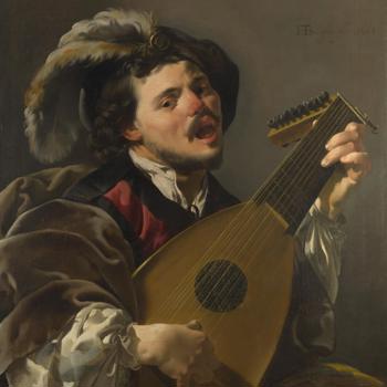 A Man playing a Lute