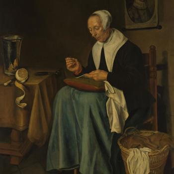 An Old Woman seated sewing