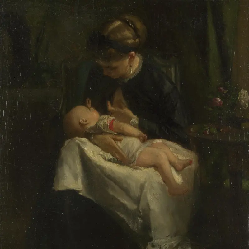 A Young Woman nursing a Baby