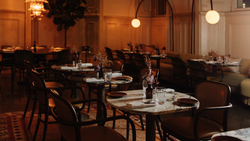 A table set for dinner at Ochre with atmospheric lighting