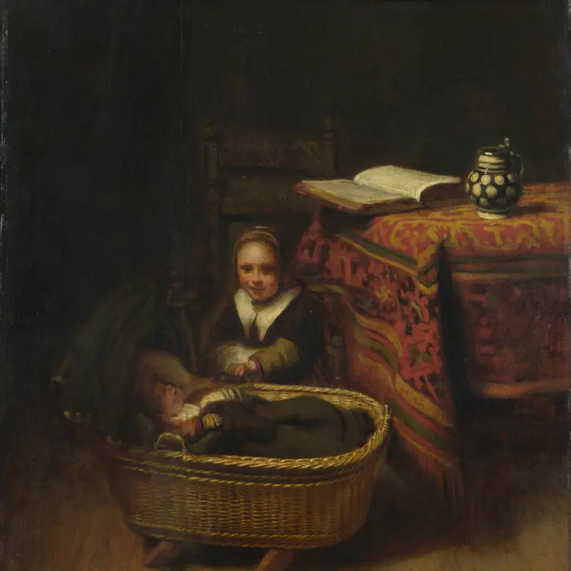 A Little Girl rocking a Cradle