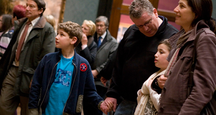 A family on a self-guided tour